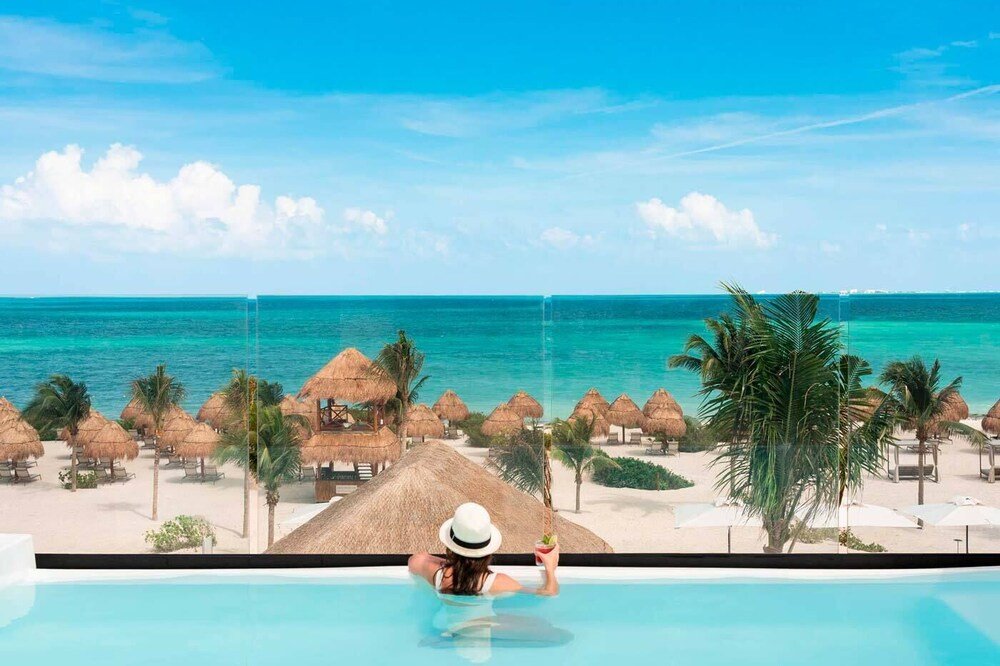Outdoor pools at Excellence Coral Playa Mujeres resort